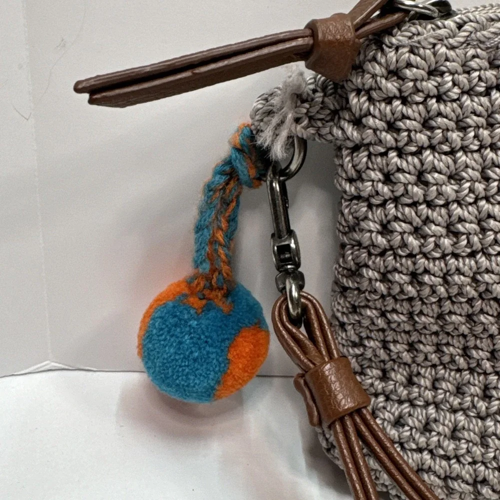 The Sak Wristlet Purse Clutch Boho Crochet Strap Zipper Pocket Grey Peace